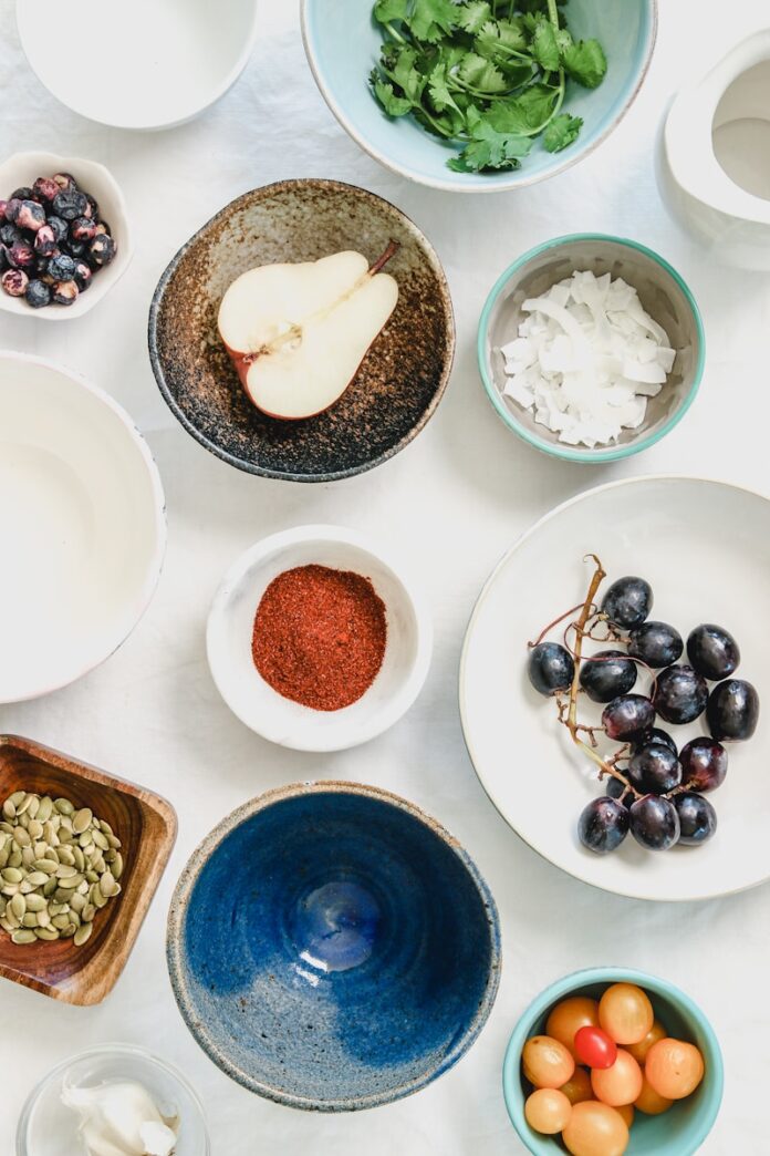 Photo by Joanie Simon An overhead shot of fruits, seeds and spices in bowls