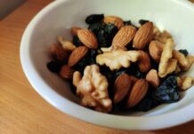 비만의 위험성과 예방을 위한 실천 방안 brown and black nuts on white ceramic bowl